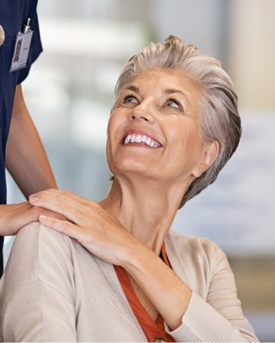 caring-nurse-comforting-old-woman-2022-03-07-17-47-45-utc.jpg